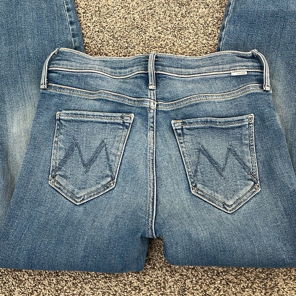 MOTHER jeans. High waisted vamp fray.